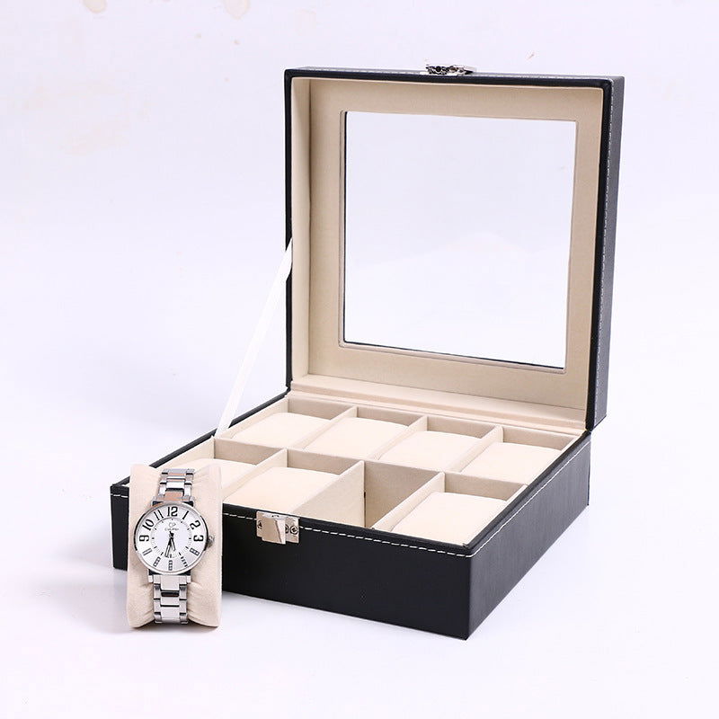 Stylish watch box organizer with black leather exterior and beige cushioned compartments with mirror inside