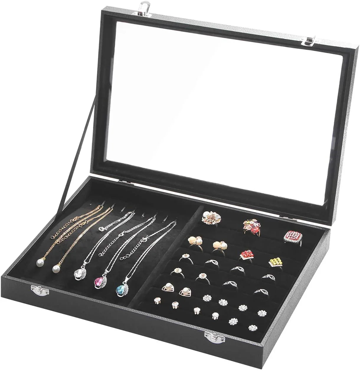 Black jewelry display case with various earrings and necklaces on a white background