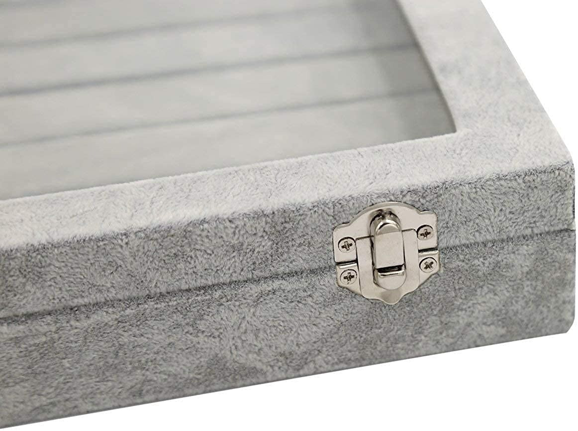 Gray jewelry box with a glass lid and metal latch on a white background