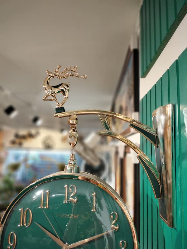Decorative clock with gold deer figure on a green background